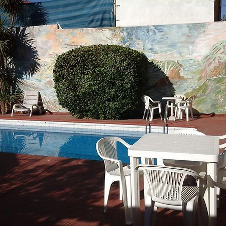 Hotel Cordoba Вилья-Карлос-Пас Экстерьер фото