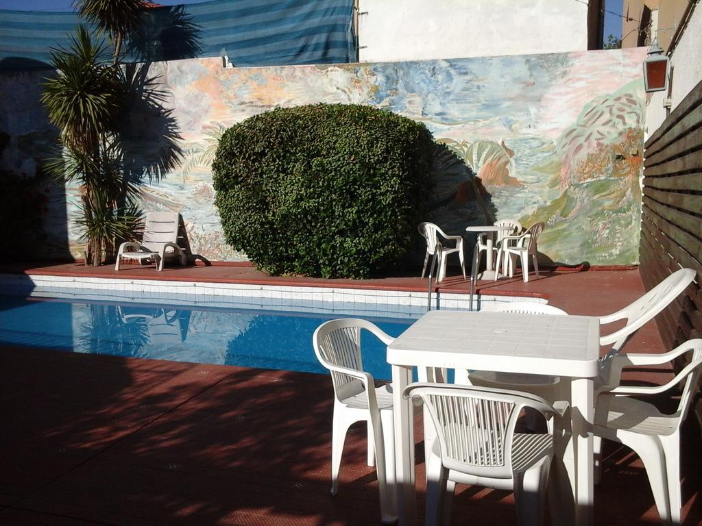 Hotel Cordoba Вилья-Карлос-Пас Экстерьер фото
